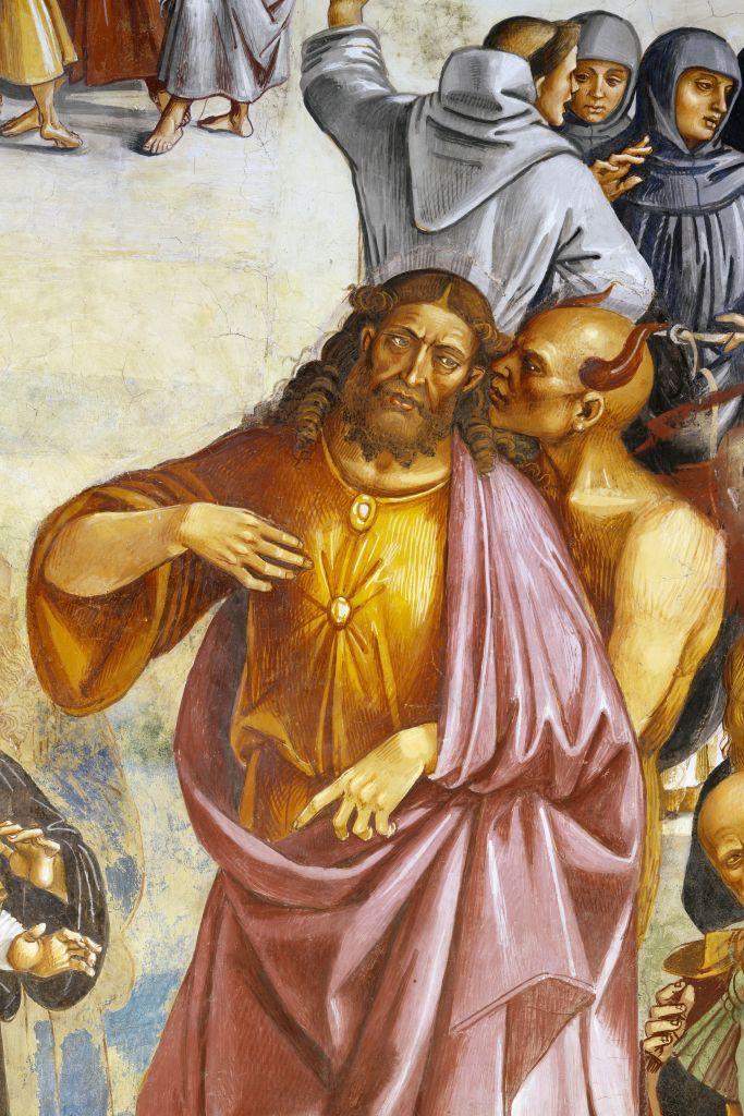 Detalj sa freske Beseda i dela Antihrista, koja je pripada ciklusu Strašni sud  autora Luke Sinjorelija u kapeli San Bricio. Antihrist je prikazan tako da podseća na Isusa, sa bradom, dugom kosom i lepršavim odećama.